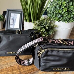 BIMBA Y LOLA CROSSBODY NYLON BAG
BLACK WITH PINK LOGO ON CROSS BODY STRAP NWT